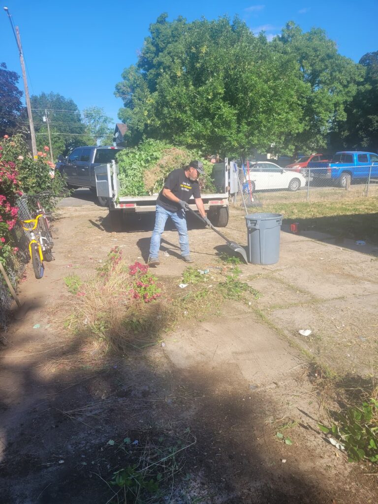 Members participating in a community clean-up event.